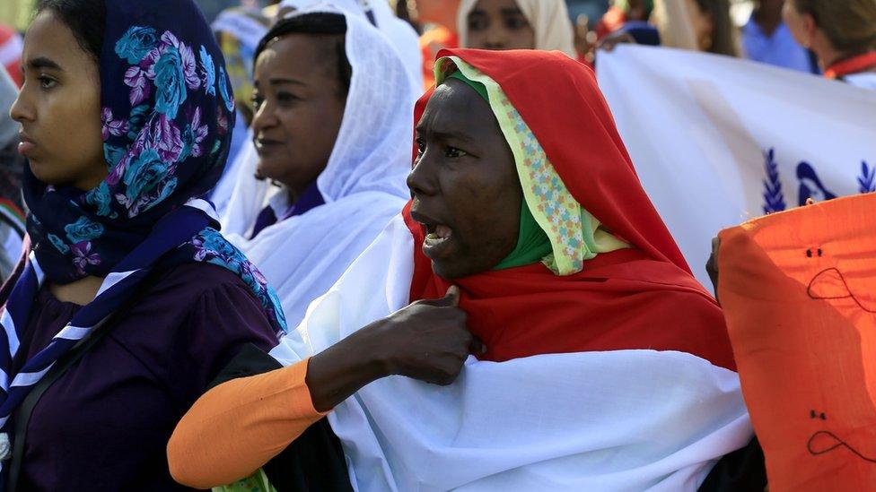 Sudanese woman chanting during a march in Khartoum marking International Day for Eliminating Violence Against Women