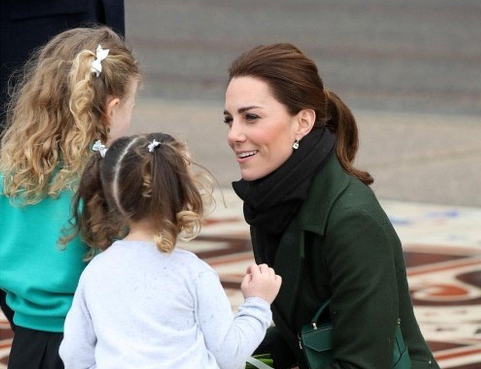 Duchess of Cambridge talking to children