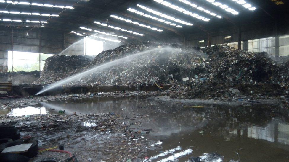 Mountains of rubbish inside the building