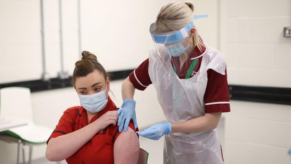 Sister Joanna Sloan getting the vaccine