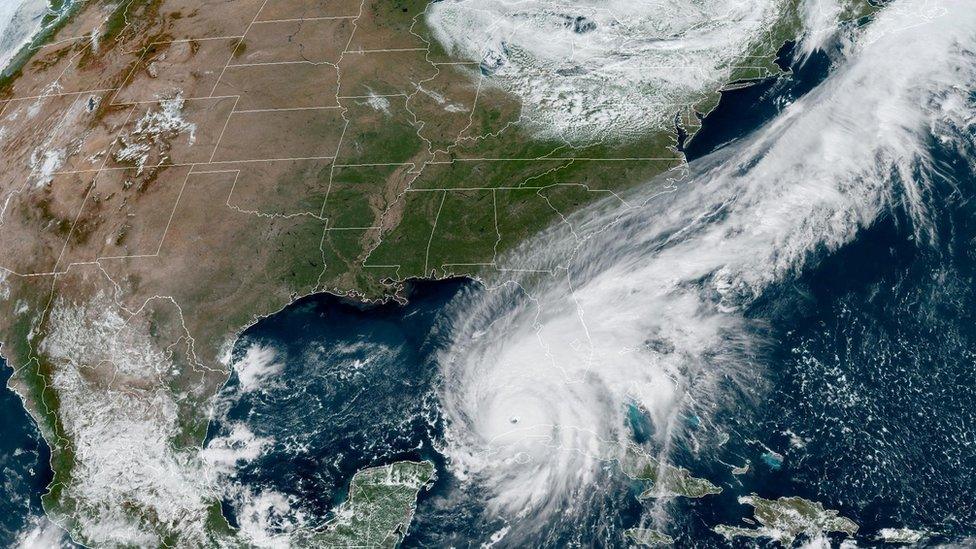 A satellite image showing a hurricane over America