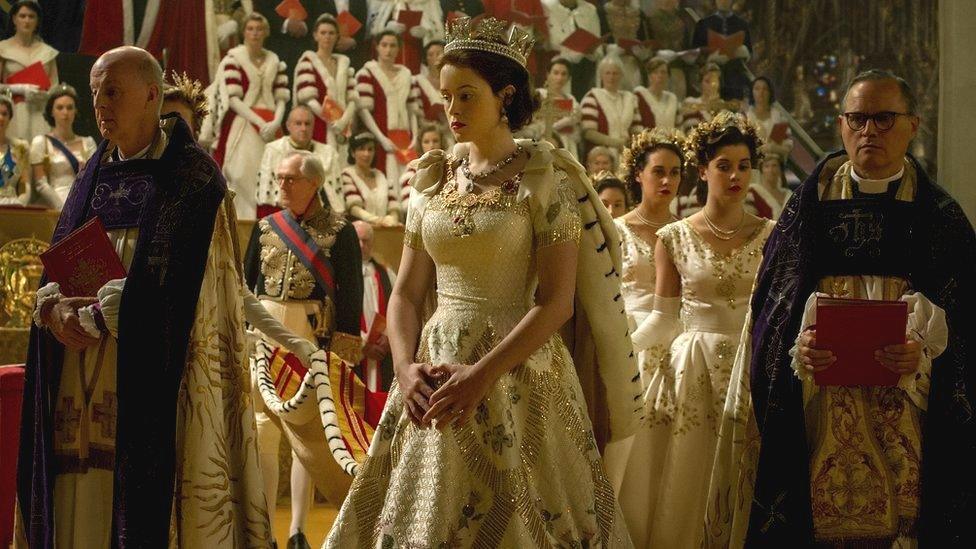 Claire Foy playing the Queen at her coronation in The Crown