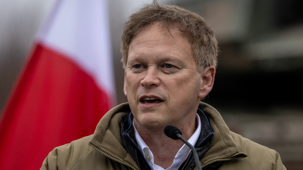 Grant Shapps speaks during a join press conference with Polish Defence Minister after their meeting on a military training compound next to Orzysz, North-Eastern Poland