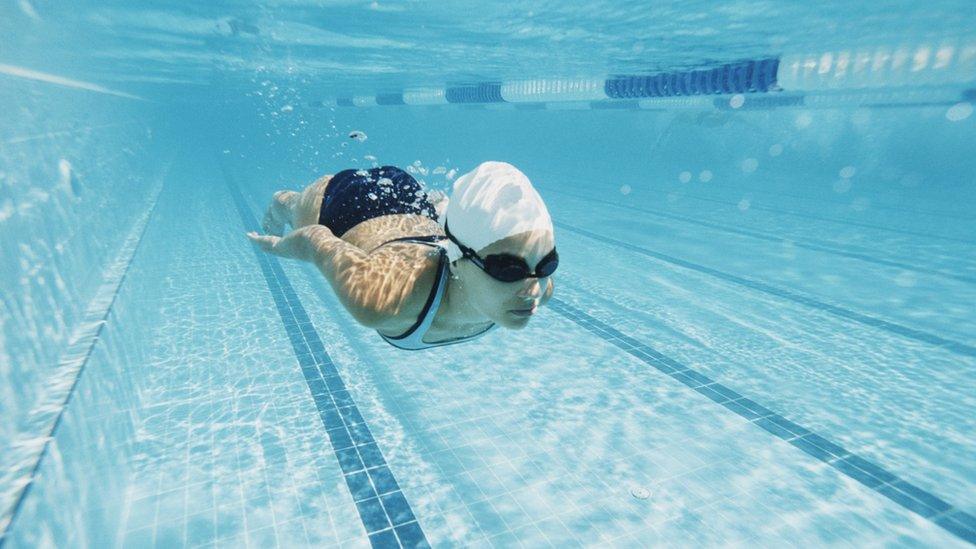 Woman in swimming pool