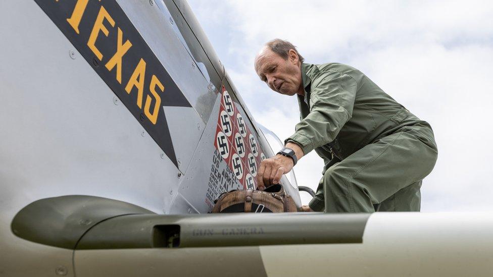 Mustang plane with a crew member