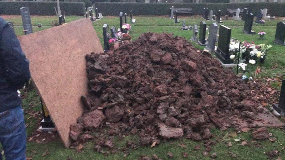 Mound of earth on top of Mr Hegarty's grave