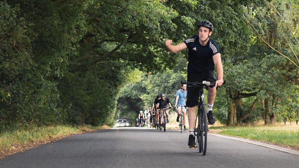 A group of cyclists cycling