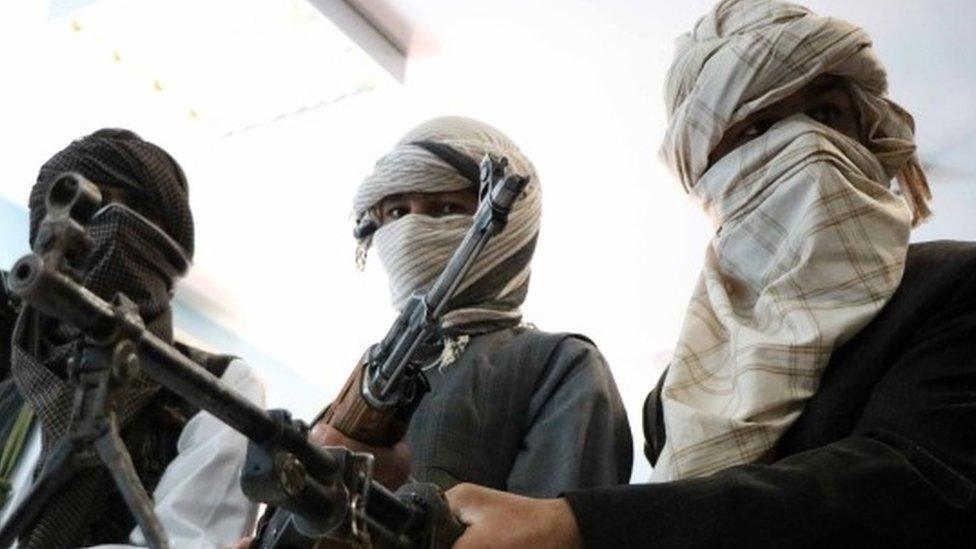 Ex-Taliban militants hand in weapons in Herat