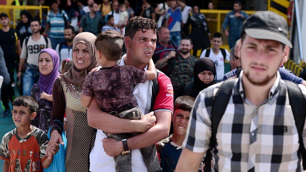 Migrant arrive near Athens on ferry from Greek islands. 9 Sept 2015