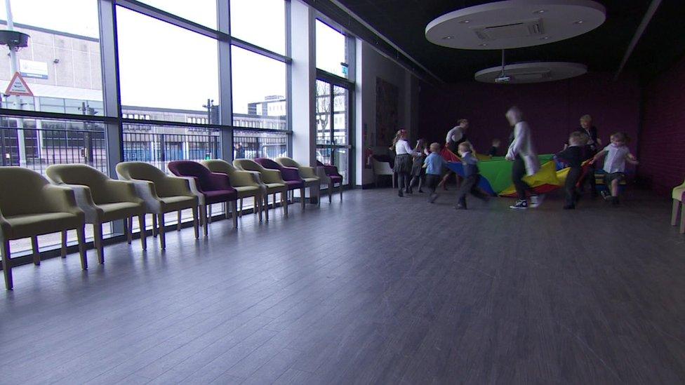 Children play in makeshift classroom