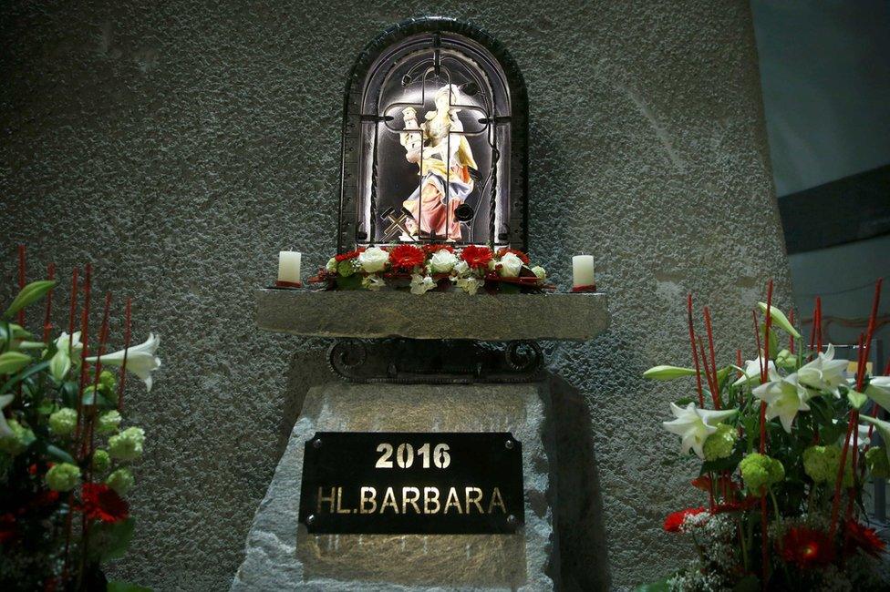 A statue of St Barbara, patron saint of miners, stands inside the Gotthard tunnel, 1 June