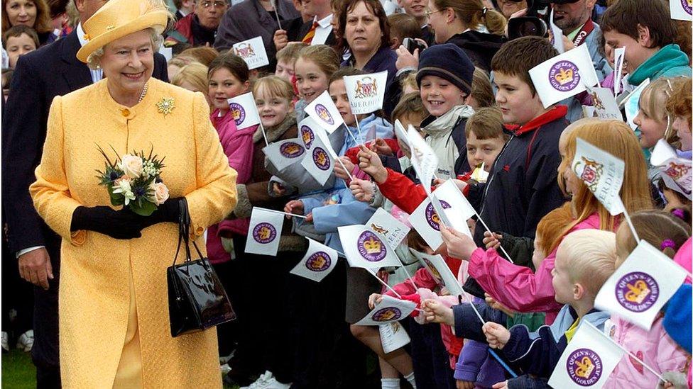 The Queen greets wellwishers during her visit to Duthie Park in Aberdeen to mark her Golden Jubilee tour in 2002