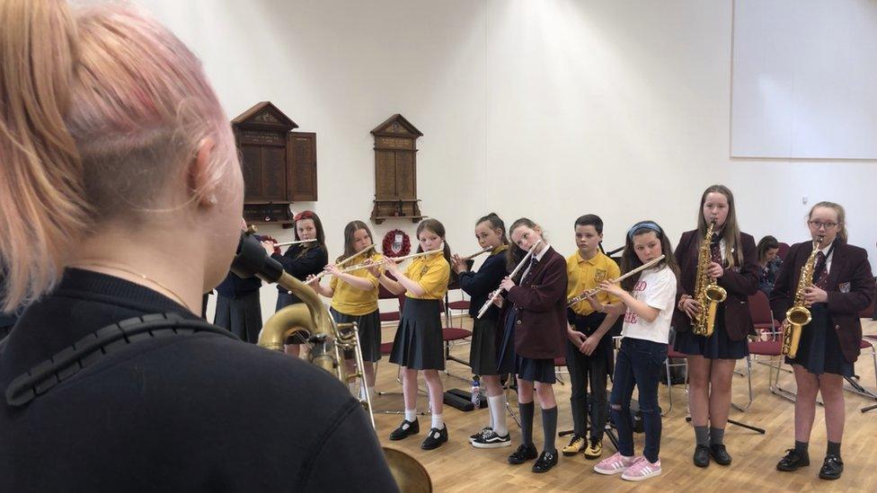 children playing wind instruments