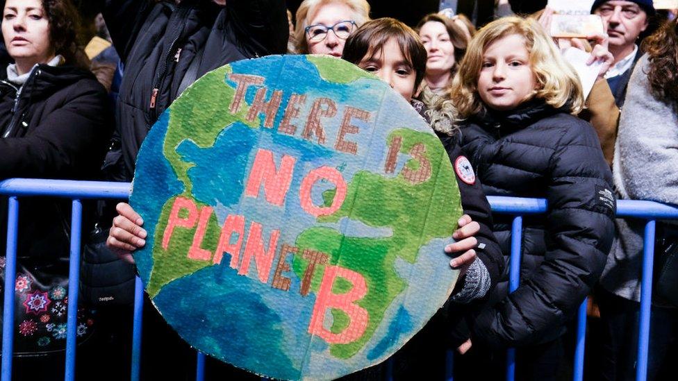 boy-with-placard.