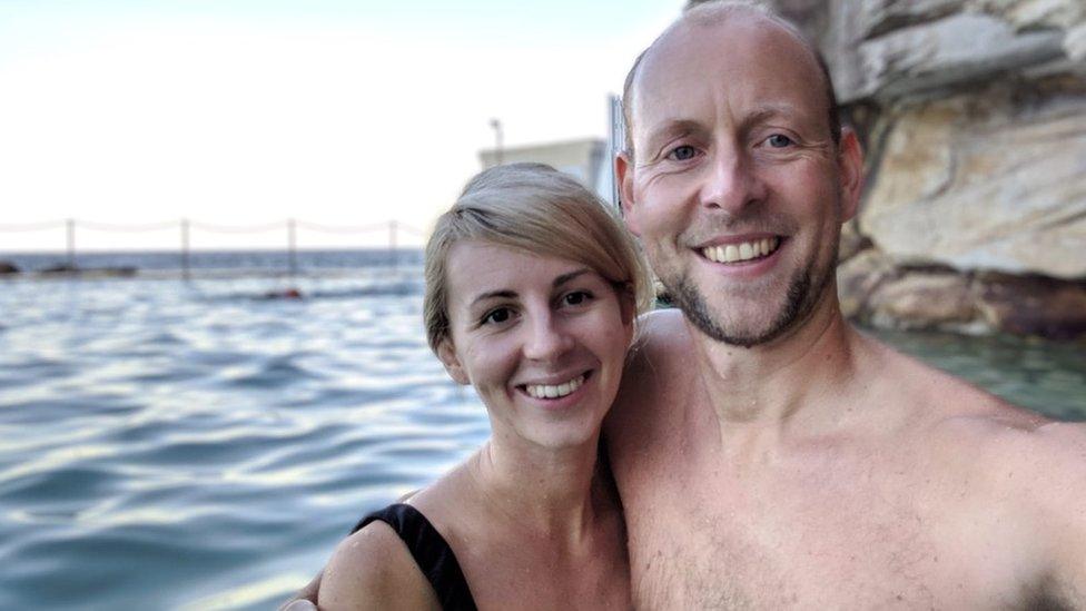 A couple at an ocean pool