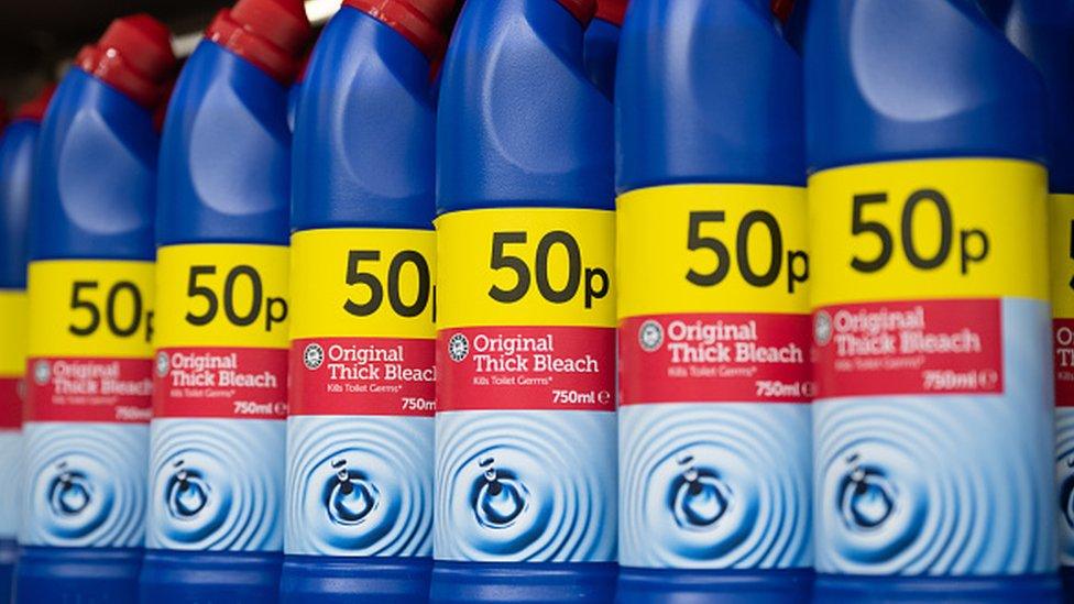 Bottles of bleach on sale in a supermarket