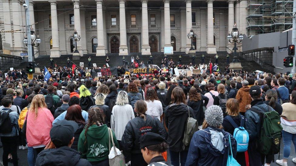 A crowd of protesters demanding justice for Mr Walker in Melbourne on 13 November