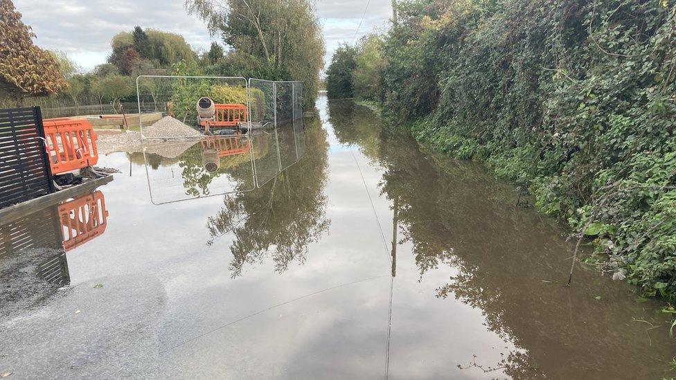 A flooded road in Trevalyn