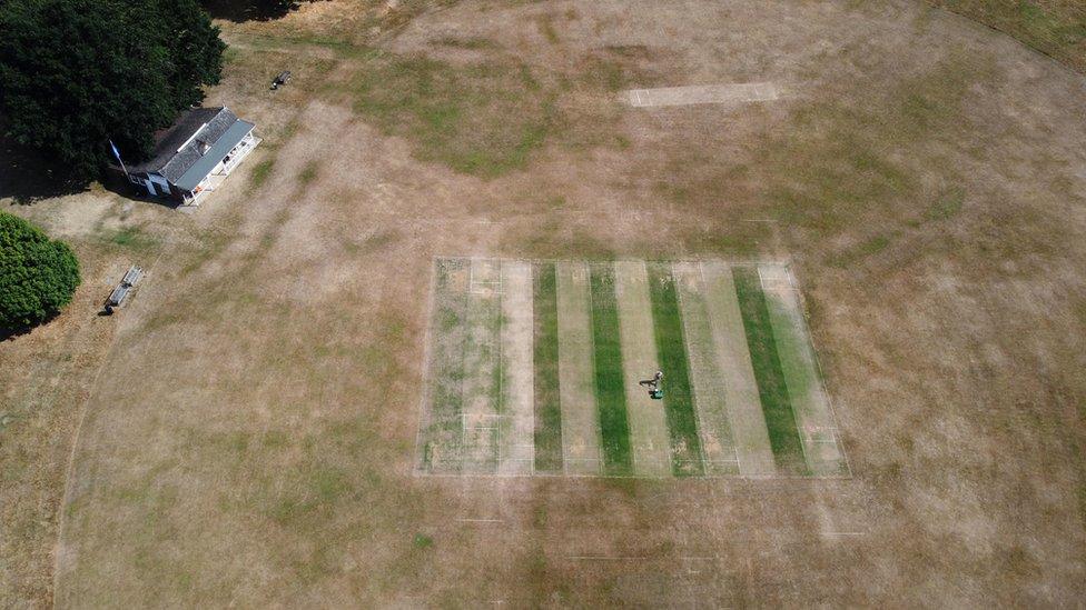 An aerial view of a dried out cricket field at Boughton and Eastwell Cricket Club in Ashford, Kent