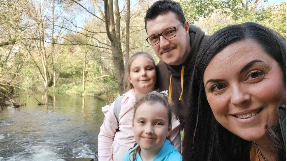 Tara with her husband John and their children Frankie, 9, and Taya, 8.