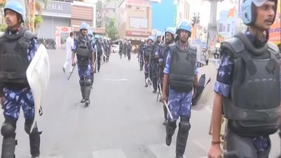 Indian Army on a flag march in the violence-hit areas