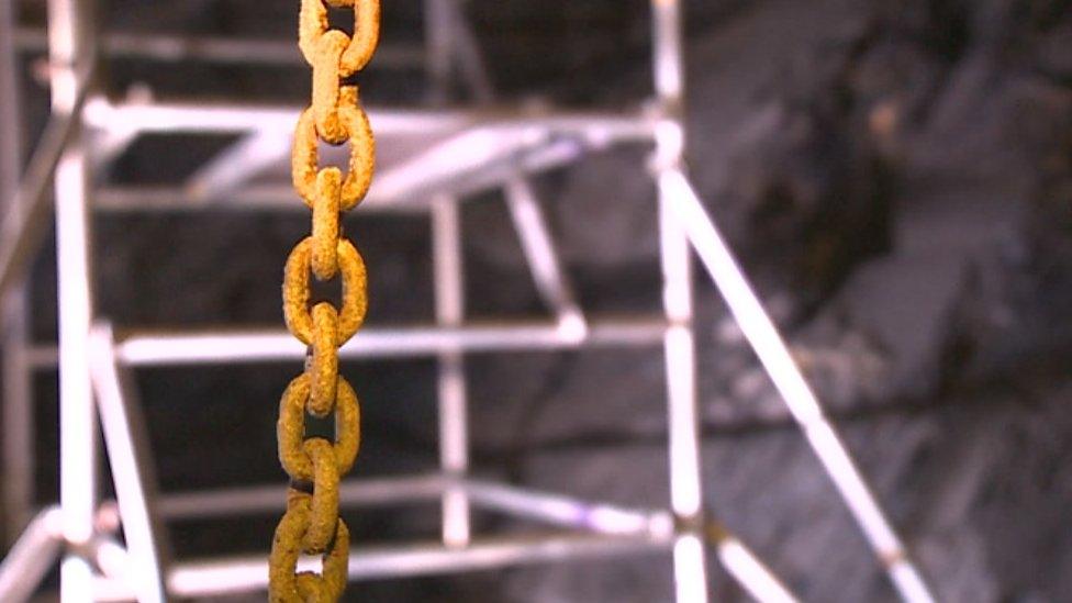 Chain inside 'Low' slate chamber