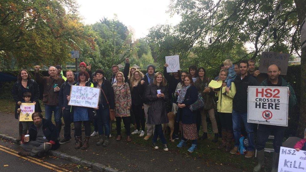 Protesters by trees