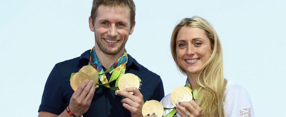 Jason Kenny and Laura Trott holding their gold medals