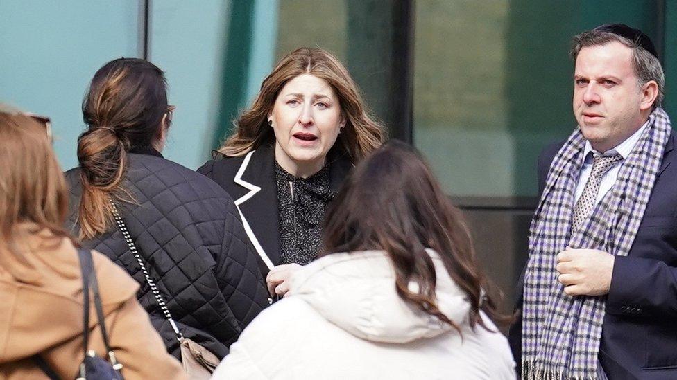 Caroline Moher (centre) arrives at Southwark Crown Court