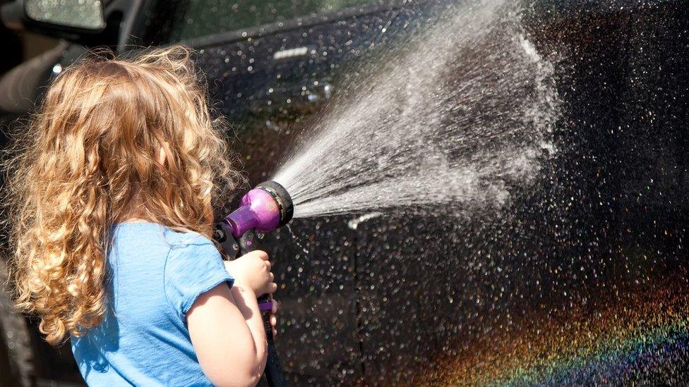 Girl with hose