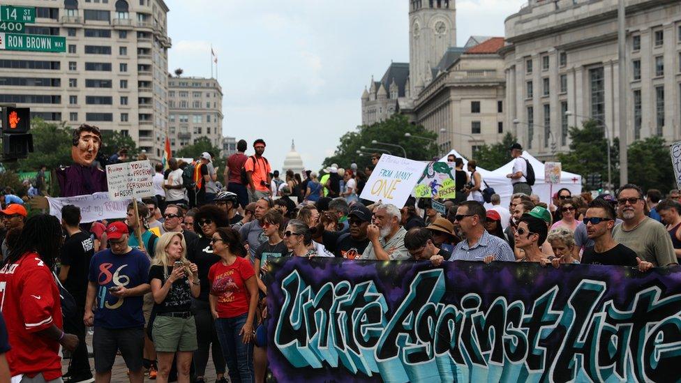 Counter protesters gather at Freedom Plaza before the Unite the Right rally in Lafayette Park across from the White House August 12, 2018