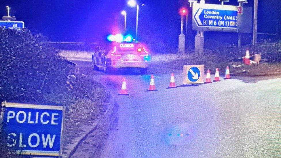 A police car at closed M6 junction