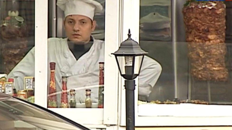 Still from TV report on kebab shops in Russia