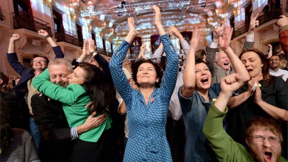 Supporters of the independent candidate in Austria's presidential election, Alexander van der Bellen, celebrate his victory, 4 December 2016