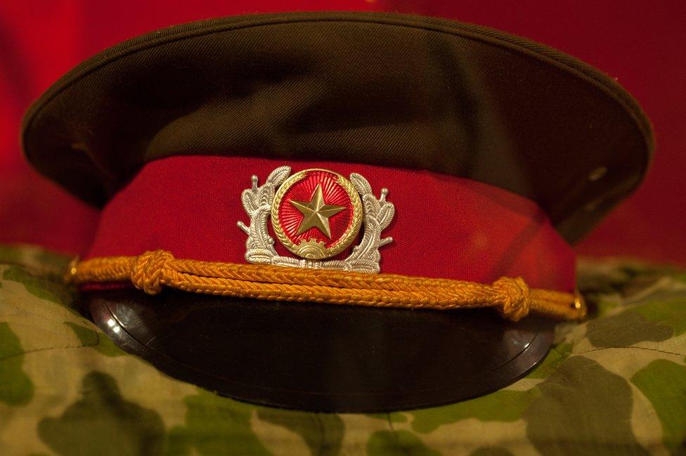 A hat and uniform belonging to a commander of the Viet Cong