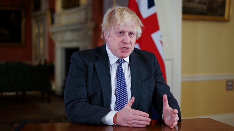 Prime Minister Boris Johnson, gestures as he records an address to the nation at Downing Street, London, to provide an update on the booster vaccine programme.