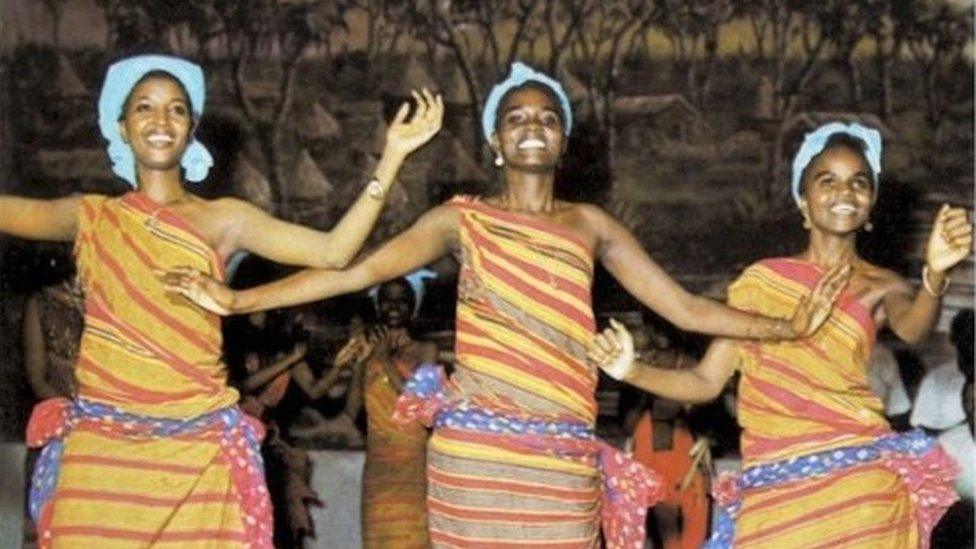 Members of Waaberi perform on stage