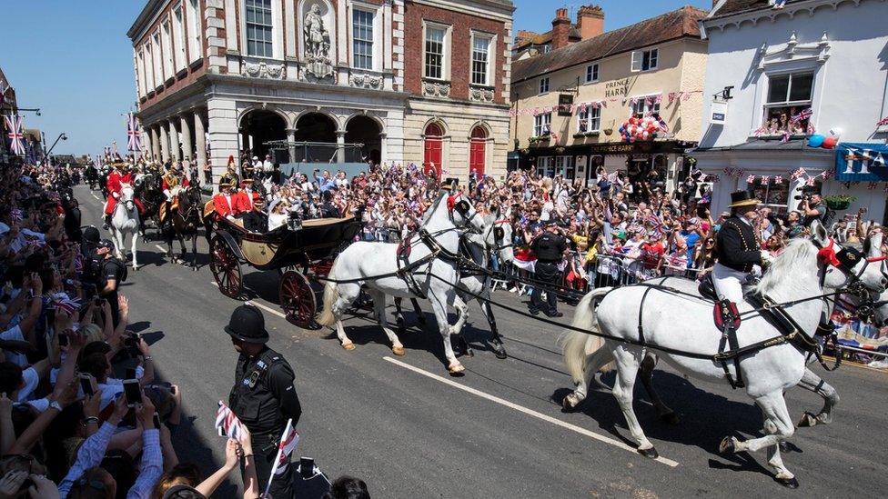 Couple in horse-drawn carriage