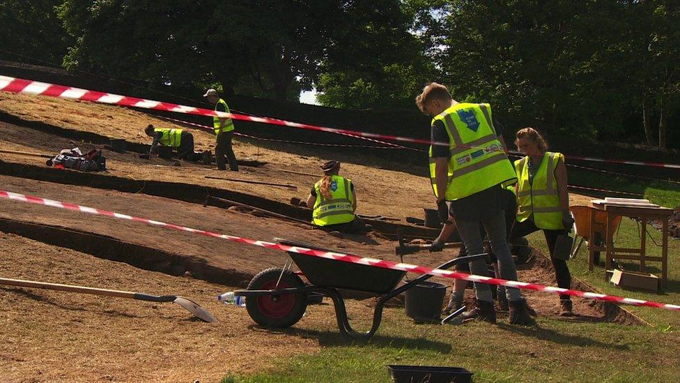 Archaeologists digging