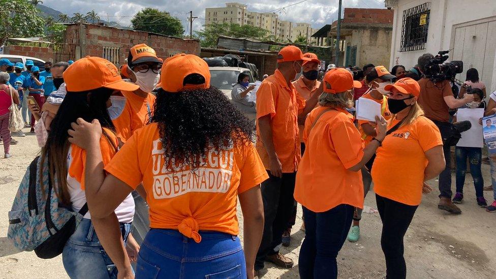 Campaign workers at a rally for David Uzcátegui