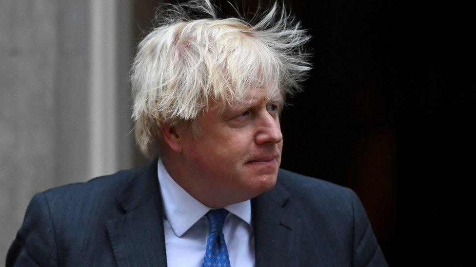 British Prime Minister Boris Johnson leaves Downing Street 10 to meet with Oman"s Sultan Haitham bin Tariq, in London, Britain December 16, 2021.