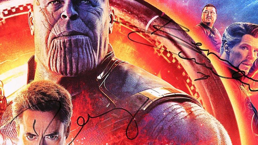 Signed Avengers poster.