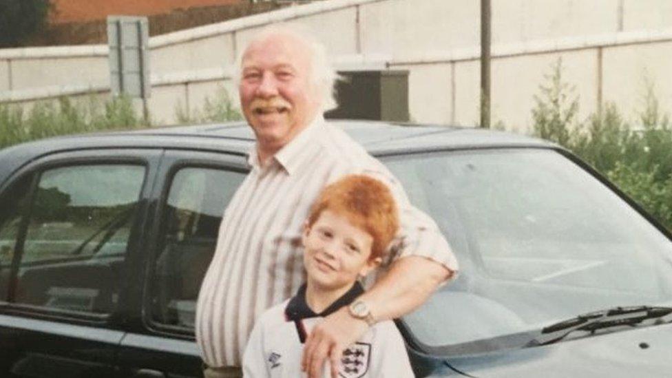 Derek Levers and his grandson