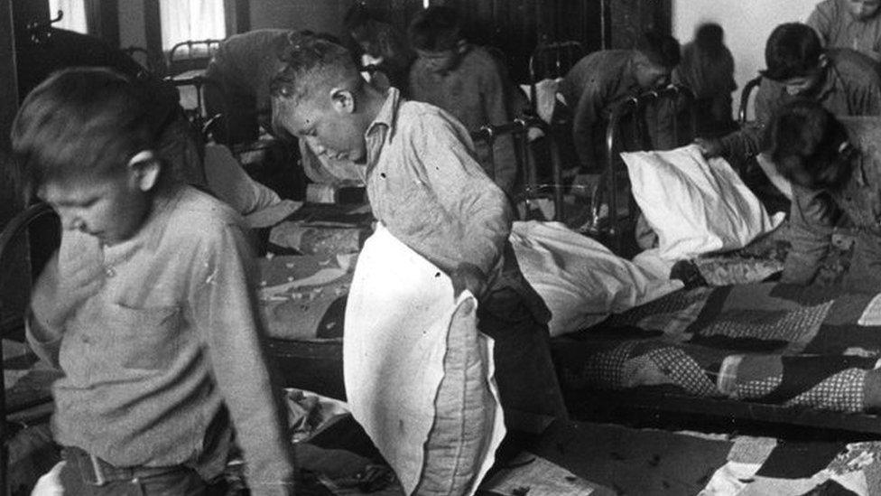 1950: North American Indian children in their dormitory at a Canadian boarding school. (Photo by Hulton Archive/Getty Images)