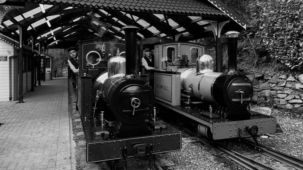 Two engines with drivers in period dress