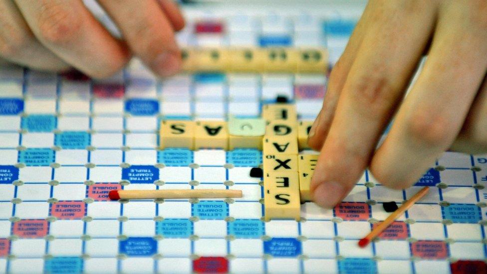 Student playing a French game