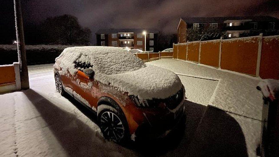 A car covered in snow in Newport, Shropshire