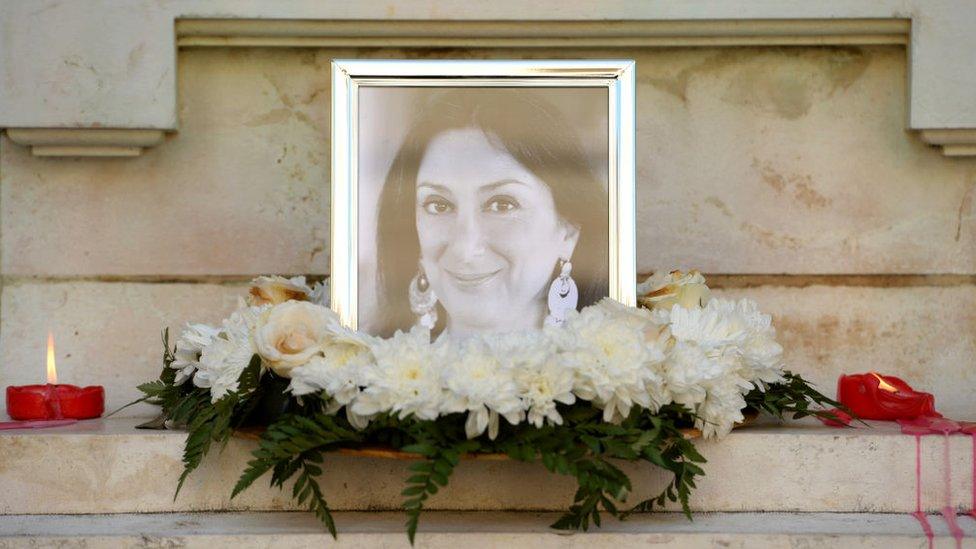 Flowers and tributes lay at the foot of the Great Siege monument in Valletta, Malta, on October 19, 2017