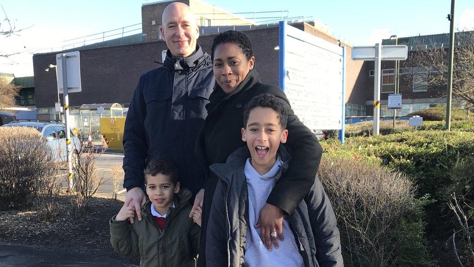 Harrison with his mum Nadia, dad Martin and brother Mason