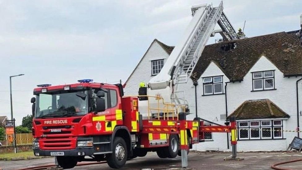 A fire engine outside the Oakwood Inn